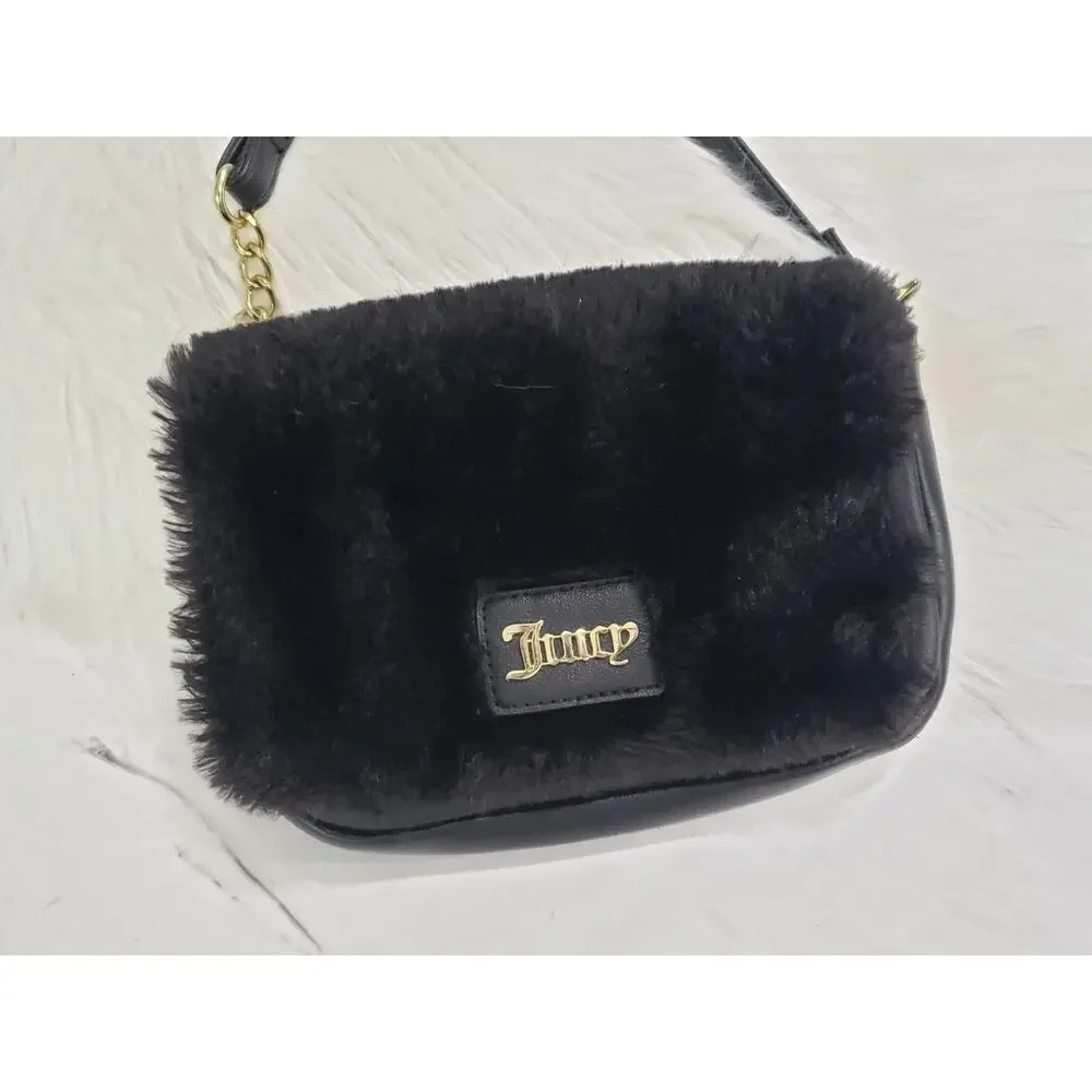 Juicy Couture measures approx